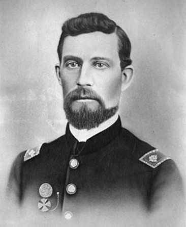 A bearded man in US army uniform of 1860s